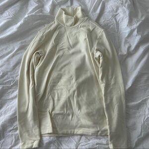 Uniqlo HEATTECH Ultra Warm cream turtleneck long sleeve top